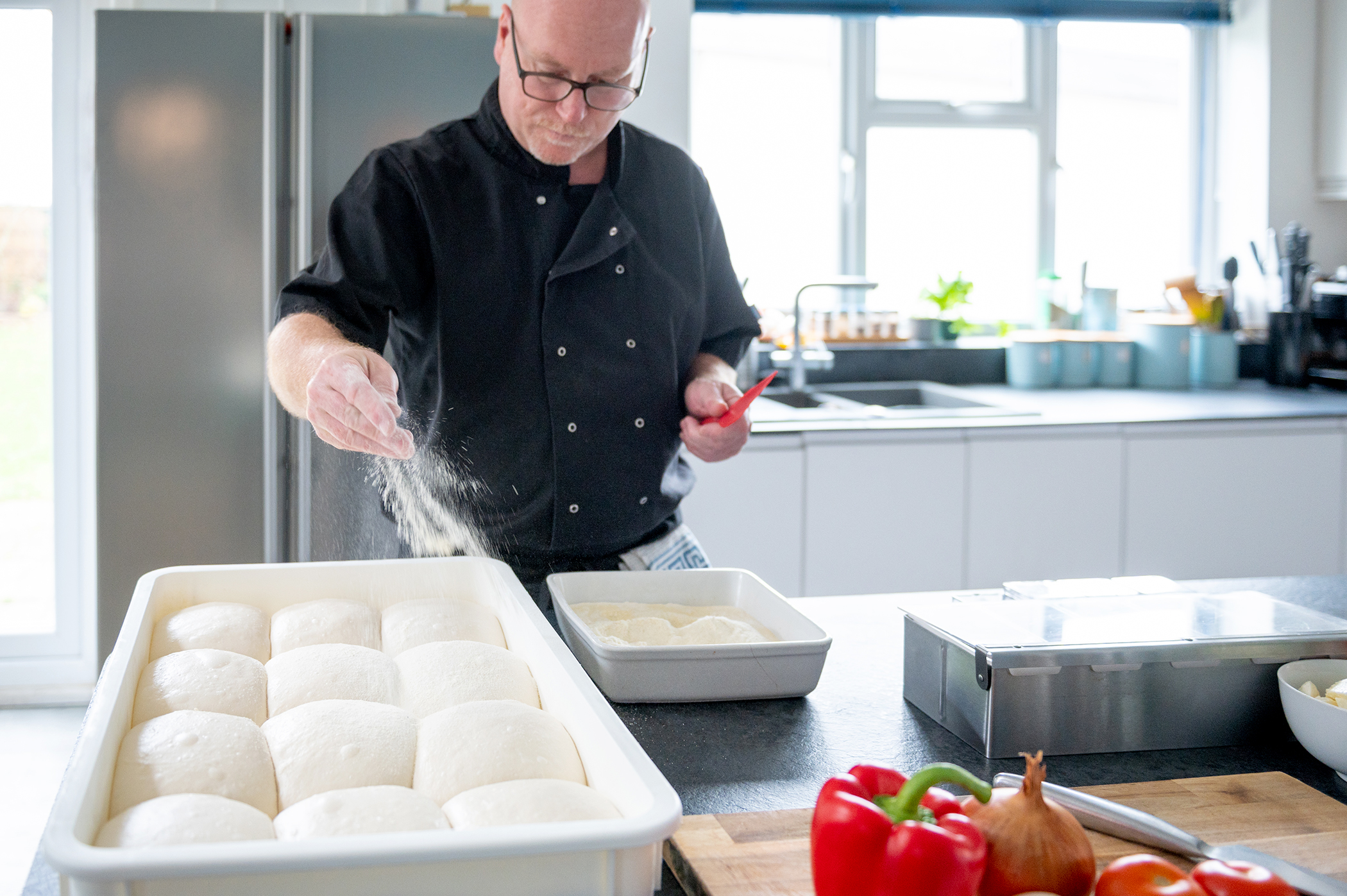 PapaGee (aka Elliott Richmond) preparing to make a pizza